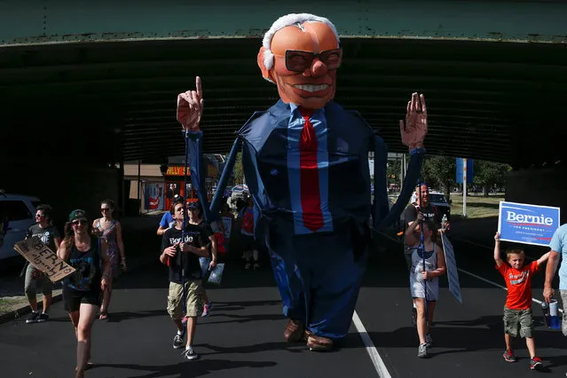 Supporters of U.S. Senator Bernie Sanders carry an effigy with his image as they take part in a protest march ahead of the 2016 Democratic National Convention in Philadelphia, Pennsylvania on July 24, 2016. (Photo by Adrees Latif/Reuters)