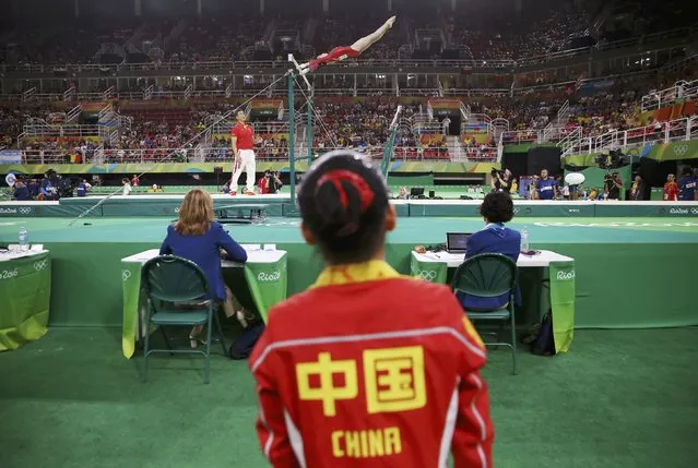 2016 Rio Olympics, Artistic Gymnastics, Preliminary, Women's Qualification, Subdivisions, Rio Olympic Arena, Rio de Janeiro, Brazil on August 7, 2016. Fan Yilin (CHN) of China (PRC) competes on the uneven bars during the women's qualifications. (Photo by Damir Sagolj/Reuters)