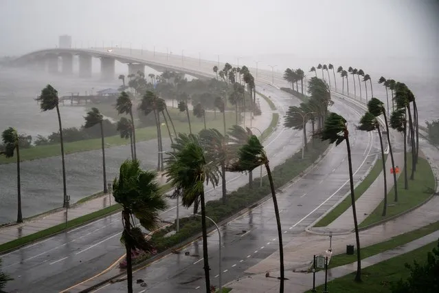 Wind gusts blow across Sarasota Bay as Hurricane Ian churns to the south on September 28, 2022 in Sarasota, Florida. The storm made a U.S. landfall at Cayo Costa, Florida this afternoon as a Category 4 hurricane with wind speeds over 140 miles per hour in some areas. (Photo by Sean Rayford/Getty Images/AFP Photo)