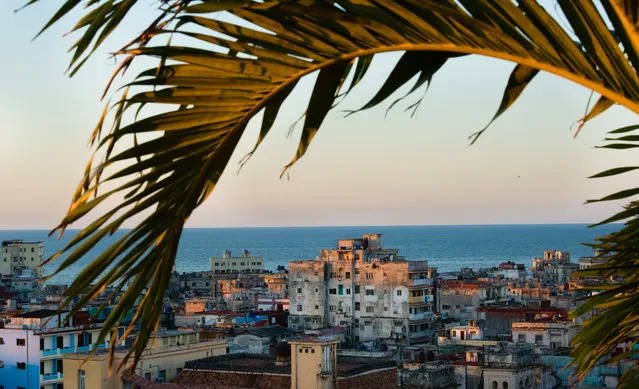 The ocean and Havana are pictured from an Old Havana rooftop. (Photo by Sarah L. Voisin/The Washington Post)