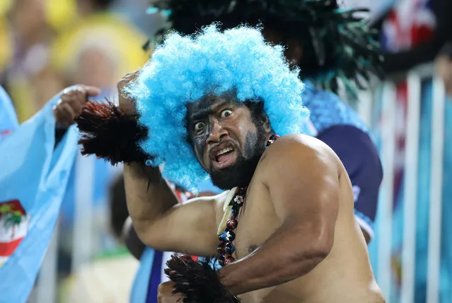 A fan of Fiji celebrates victory after his side won the Rugby Sevens Men's Gold Medal Match between Fiji and Great Britain at the Deodoro Stadium on the sixth day of the Rio Olympic Games, Brazil on Thursday August 11, 2016. (Photo by Owen Humphreys/PA Wire)
