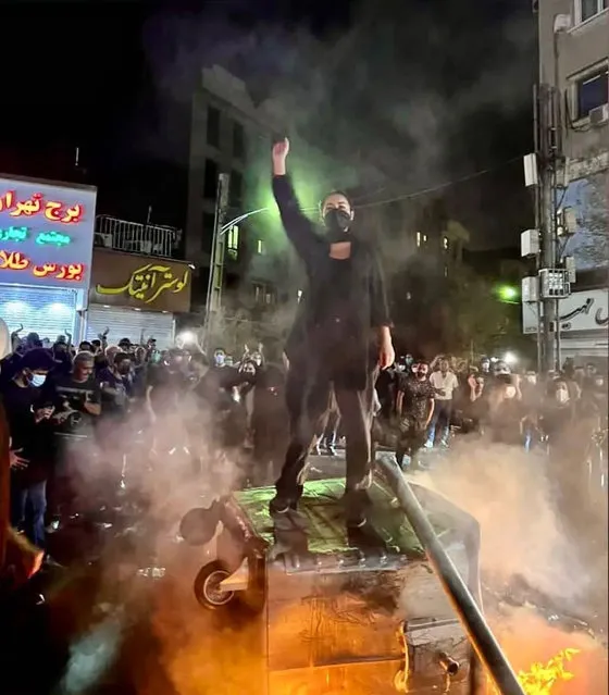 This photo shows that Iranian women are on the front line of the protests and are fighting against the agents of repression in Tehran, Iran on September 28, 2022. (Photo by Social Media/Rex Features/Shutterstock)