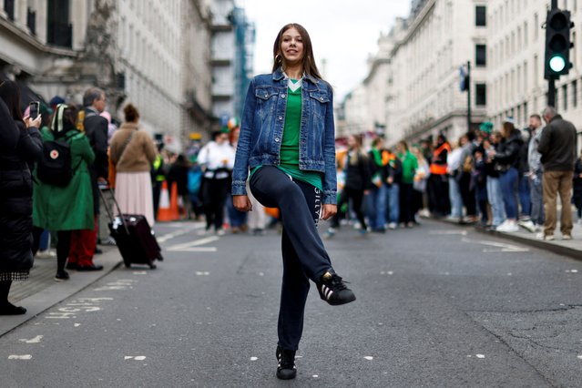 A person takes part in a parade on the day of St Patrick's Festival in London, on March 16, 2025. (Photo by Carlos Jasso/Reuters)