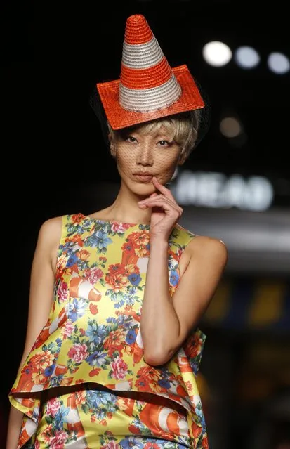 A model wears a creation for Moschino women's spring-summer 2016 collection, part of the Milan Fashion Week, unveiled in Milan, Italy, Thursday, September 24, 2015. (Photo by Luca Bruno/AP Photo)