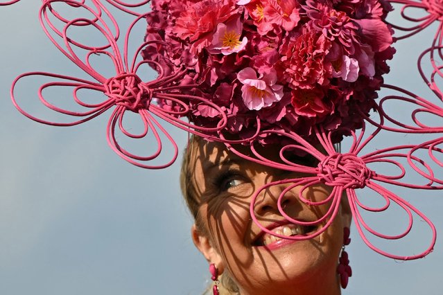 Ladies Day fashions on display on day two of the Grand National Festival horse race meeting at Aintree Racecourse in Liverpool, north-west England, on April 4, 2025. (Photo by Oli Scarff/AFP Photo)
