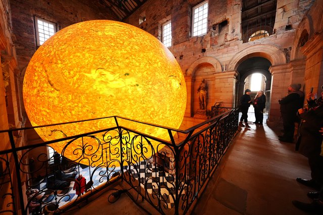 The Helios sculpture of the sun by Luke Jerram goes on display at the National Trust's Seaton Delaval Hall in Northumberland, UK on Wednesday, March 19, 2025. Helios features a detailed images of the sun's surface with photographs from NASA. (Photo by Owen Humphreys/PA Images via Getty Images)