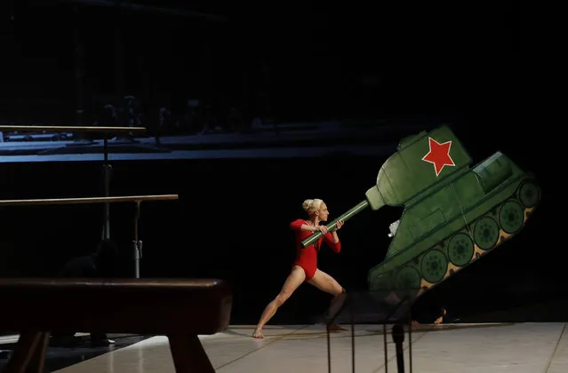 A dancer performs during a memorial service for Vera Caslavska, a Olympic gymnastics champion, at the National Theater in Prague, Czech Republic, Monday, September 12, 2016. Czechs are paying a final farewell to late Vera Caslavska, a seven-time Olympic gymnastics champion best remembered for her protest against the Soviet-led invasion of Czechoslovakia in 1968. Caslavska died on August 30, 2016 at age 74. (Photo by Petr David Josek/AP Photo)