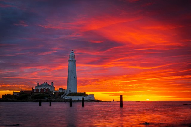 A spectacular sunrise morning August 4, 2020 from St Mary's Island North Tyneside in North East England. (Photo by South West News Service)