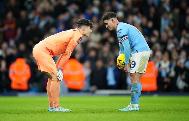 Kepa Arrizabalaga of Chelsea speaks to Julian Alvarez of Manchester City before a Manchester City penalty during the Emirates FA Cup Third Round match between Manchester City and Chelsea at Etihad Stadium on January 08, 2023 in Manchester, England. (Photo by Tom Flathers/Manchester City FC via Getty Images)
