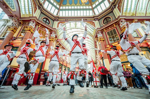 To celebrate St. George's Day, Leadenhall Market in London hosts traditional Morris dancing on the cobbled lanes of the Victorian market on April 23, 2024. Performed by the Ewell St Mary's Morris Men accompanied by live music. They performed in traditional costume complete with bells and handkerchiefs. (Photo by Guy Bell/Rex Features/Shutterstock)