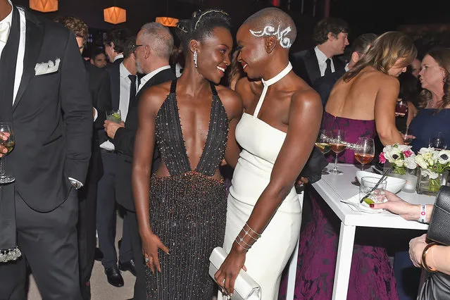 Lupita Nyong'o (L) and Danai Gurira attends the 2018 Vanity Fair Oscar Party hosted by Radhika Jones at Wallis Annenberg Center for the Performing Arts on March 4, 2018 in Beverly Hills, California. (Photo by Nicholas Hunt/VF18/WireImage)