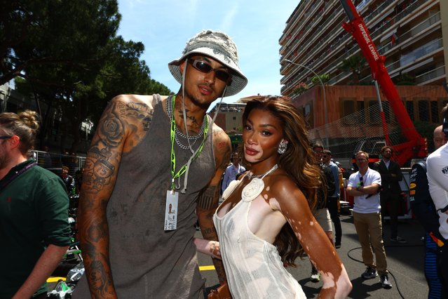 American professional basketball player Kyle Kuzma and Canadian fashion model Winnie Harlow pose for a photo on the grid prior to the F1 Grand Prix of Monaco at Circuit de Monaco on May 26, 2024 in Monte-Carlo, Monaco. (Photo by Mark Thompson/Getty Images)