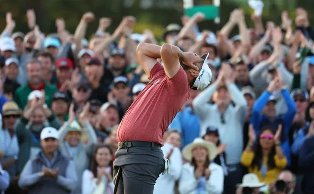 Spain's Jon Rahm celebrates on the 18th green after winning The Masters at Augusta National Golf Club, Augusta, Georgia on April 9, 2023. (Photo by Mike Segar/Reuters)