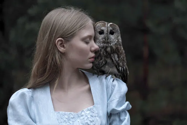 “Yulia with an owl” …and were shot by photographer, Olga Barantseva. (Photo by Olga Barantseva/Caters News Agency)