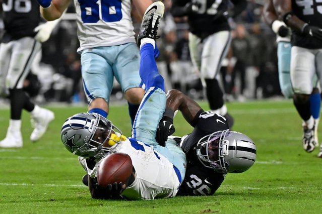 Dallas Cowboys wide receiver George Pickens, left, tries to reach for the endzone as Las Vegas Raiders cornerback Kyu Blu Kelly makes the tackle during the second half of an NFL football game Monday, November 17, 2025, in Las Vegas. (Photo by John Locher/AP Photo(
