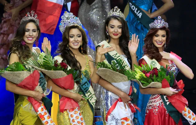 Miss Ecuador Katherine Espin (2nd L), crowned this year's Miss Earth, Miss Colombia Michelle Gomez (2nd R), won as Miss Earth Air, Miss Brazil Bruna Zanardo (L), as Miss Earth Fire and Miss Venezuela Stephanie De Zorzi, won as Miss Earth Water, wave to photographers during the Miss Earth 2016 International coronation night at a mall in Pasay city, metro Manila, Philippines October 29, 2016. (Photo by Romeo Ranoco/Reuters)
