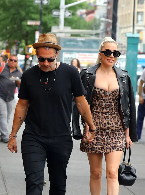 Pop star Lady Gaga and boyfriend Christian Carino are seen holding hands as they walk in midtown Manhattan in New York, NY on June 28, 2018. (Photo by Splash News and Pictures)