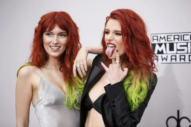 Dani (L) and Bella Thorne arrive at the 2016 American Music Awards in Los Angeles, California, U.S., November 20, 2016. (Photo by Danny Moloshok/Reuters)