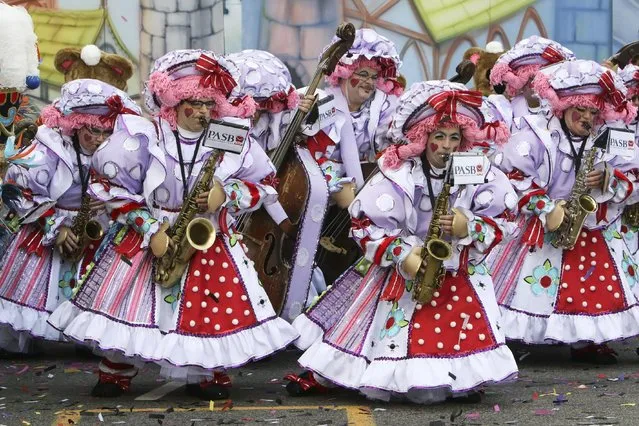 Members of the Polish American String Band perform during the 116th annual Mummers Parade in Philadelphia on Friday, January 1, 2016. (Photo by Joseph Kaczmarek/AP Photo)