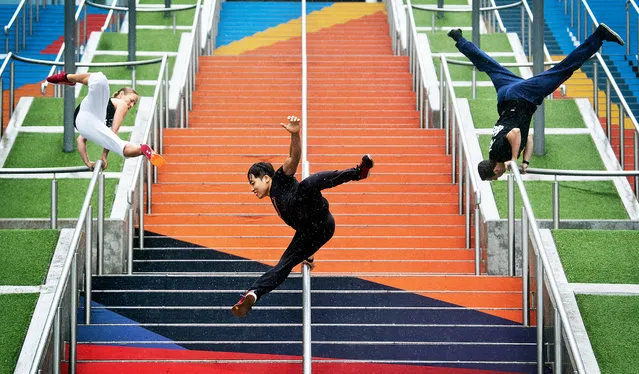 People performing Parkour outside Wembley Stadium in London, UK on Thursday August 16, 2018, ahead of the Rendezvous International Parkour Gathering XIII 2018 at Wembley Park on August 18-19 weekend. (Photo by Victoria Jones/PA Wire)