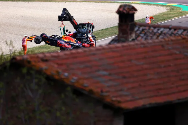 The car of Sergio Perez of Mexico and Red Bull Racing is removed from the circuit after stopping on track during practice ahead of the F1 Grand Prix of Emilia Romagna at Autodromo Enzo e Dino Ferrari on April 16, 2021 in Imola, Italy. (Photo by Lars Baron/Getty Images)