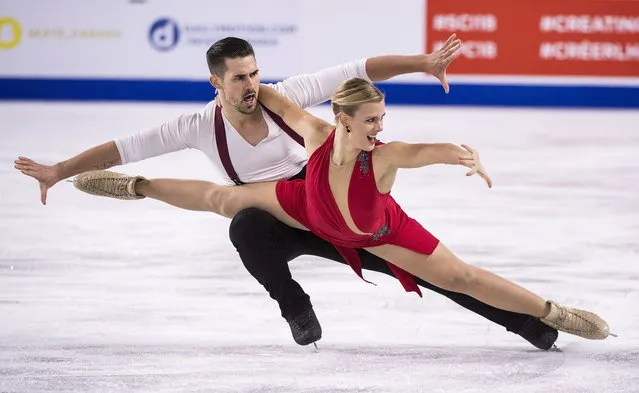 Madison Hubbell and Zachary Donohue, of the United States, perform their rhythm dance in the ice dance competition at Skate Canada International in Laval, Quebec, Friday, October 26, 2018. (Photo by Paul Chiasson/The Canadian Press via AP Photo)