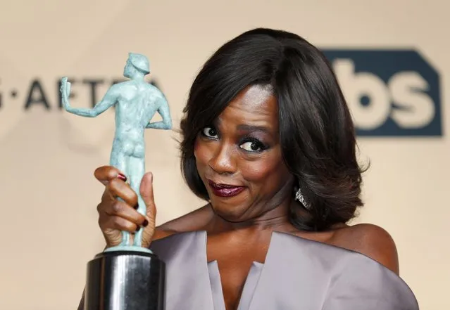 Viola Davis holds the award for Outstanding Performance by a Female Actor in a Drama Series for her role in “How to Get Away With Murder” during the 22nd Screen Actors Guild Awards in Los Angeles, California January 30, 2016. (Photo by Mike Blake/Reuters)