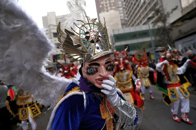 Members of a “Diablada” folk group dance during celebrations of the anniversary of Bolivia foundation, in Santiago, Chile on August 6, 2022. (Photo by Ivan Alvarado/Reuters)