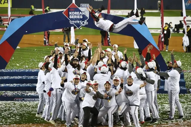 LG Twins players throw their manager Youm Kyung-youb into the air after winning the Korean Series Game Five between LG Twins and KT Wiz at Jamsil Stadium on November 13, 2023 in Seoul, South Korea. (Photo by Chung Sung-Jun/Getty Images)