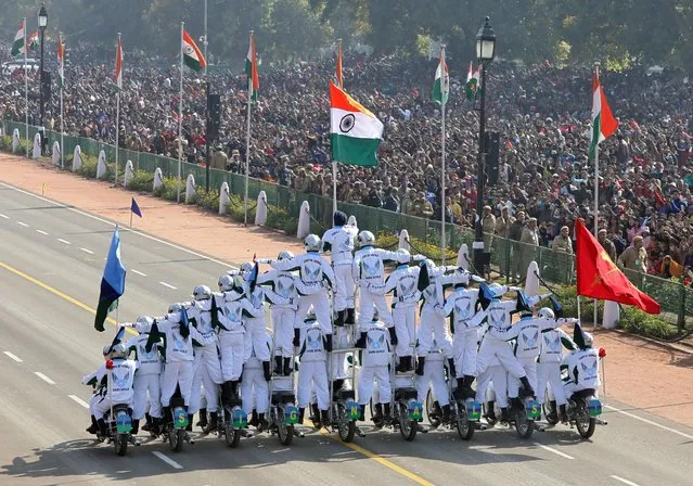 India's Border Security Force (BSF) “Daredevils” motorcycle riders take part in the Republic Day parade in New Delhi, India, January 26, 2019. (Photo by Altaf Hussain/Reuters)