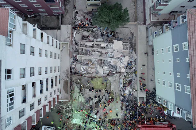 Aerial photo shows rescue mission is being carried out on the debris of 7-story building after it collapsed in Kartal district of Istanbul, Turkey on February 06, 2019. Scores of firefighters, police officials, medical personnel as well as national Disaster and Emergency Management (AFAD) teams continue the rescue mission. (Photo by Yunus Emre Gunaydin/Anadolu Agency/Getty Images)