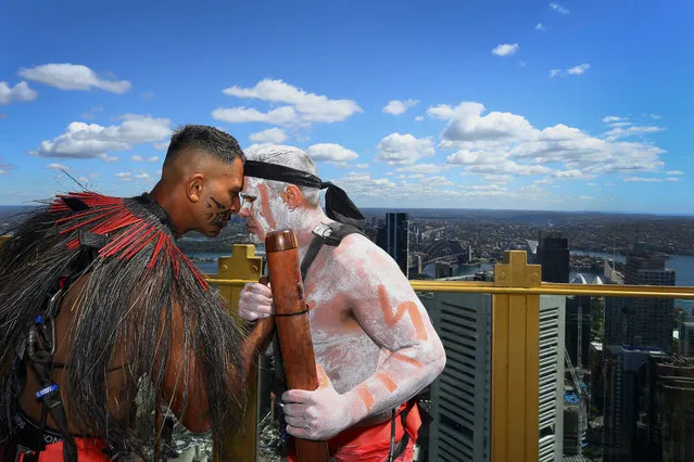 Haka For Life member Arohi Chapman-Barber greets First Nations performer, Wiradjuri man Karl Wickey at the Sydney Tower Eye on November 17, 2022 in Sydney, Australia. To inspire conversations around mental health on International Mens Day, performers from Haka For Life took to Sydney's tallest stage, Skywalk at the Sydney Tower Eye. (Photo by Lisa Maree Williams/Getty Images)