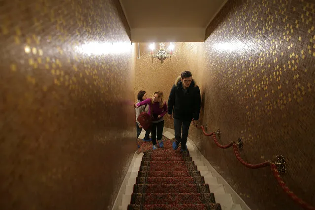 A tour guide leads the way for two Russian tourists during their visit at Romania's former communist dictator Nicolae Ceausescu' villa in Bucharest, Romania January 25, 2017. (Photo by Octav Ganea/Reuters/Inquam Photos)