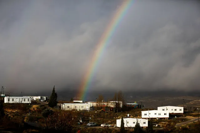 A rainbow is seen over the Israeli settler outpost of Amona in the occupied West Bank January 31, 2017. (Photo by Ronen Zvulun/Reuters)