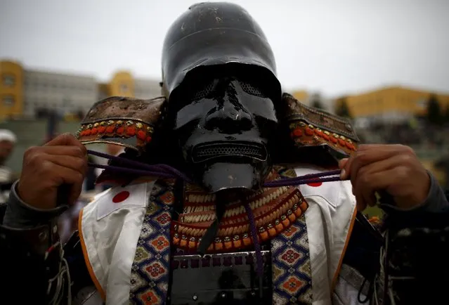 A Japanese competitor prepares himself before fighting in the Medieval Combat World Championship at Malbork Castle, northern Poland, April 30, 2015. (Photo by Kacper Pempel/Reuters)