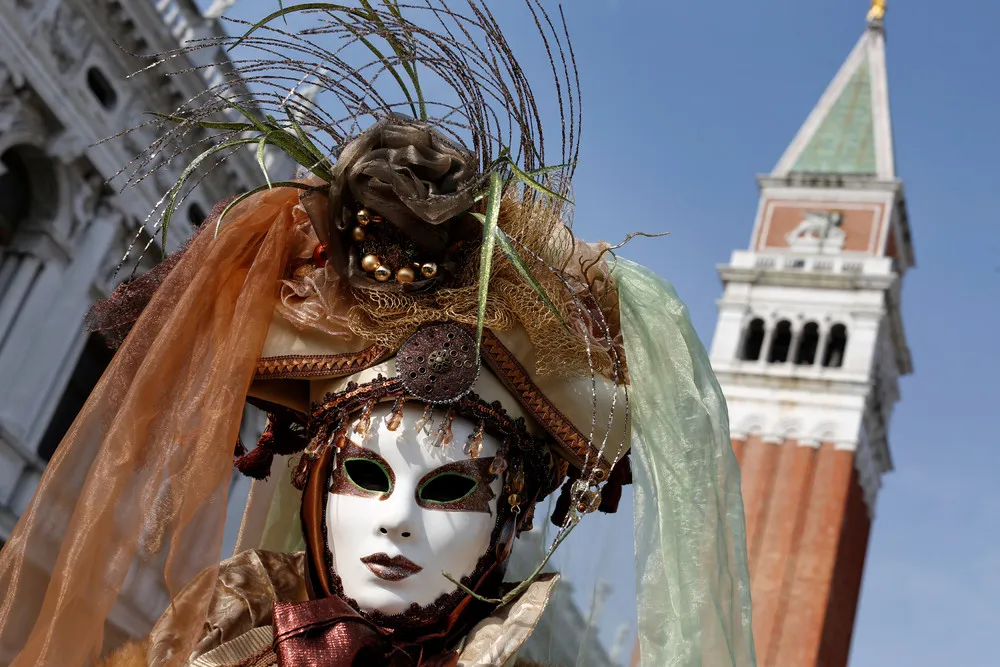 Venice Welcomes Masked Revellers