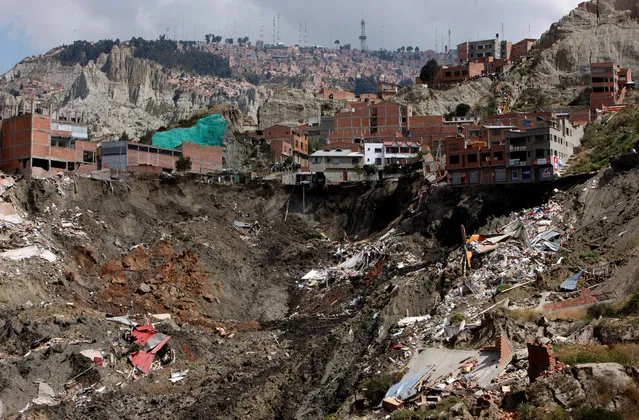 The debris of houses destroyed in a landslide are seen in La Paz, Bolivia, May 1, 2019. (Photo by Manuel Claure/Reuters)