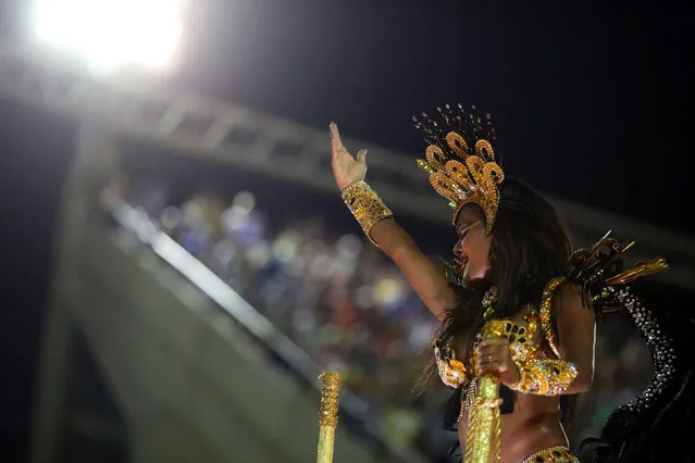 A reveller from Sao Clemente samba school performs during the second night of the carnival parade at the Sambadrome in Rio de Janeiro, Brazil February 27, 2017. (Photo by Pilar Olivares/Reuters)