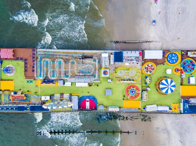 Orginally the Showplace of the Nation, the 1,000-foot-long Steel Pier was once the crown jewel of northeastern entertainment venues. (Photo by Chase Guttman/Caters News)