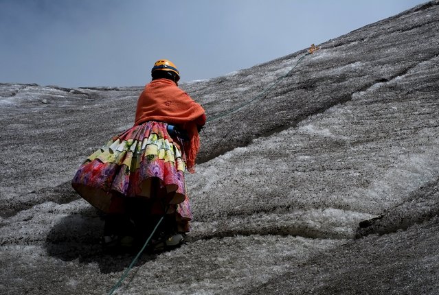 An Aymara indigenous woman practises climbing on the Huayna Potosi mountain, Bolivia April 6, 2016. (Photo by David Mercado/Reuters)