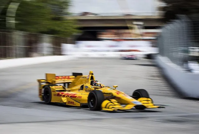 Ryan Hunter-Reay, of the United States, makes a corner during practice for the IndyCar auto race Saturday, June 13, 2015, in Toronto. (Aaron Vincent Elkaim/The Canadian Press via AP)