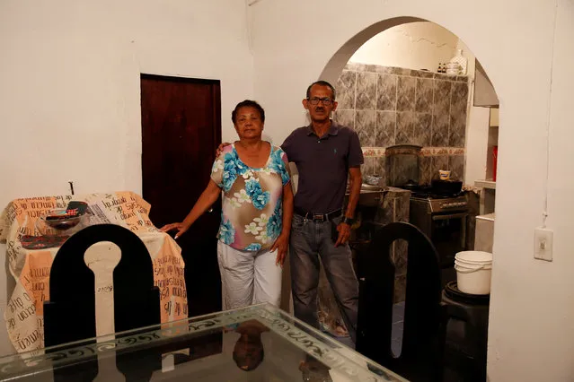 Mirella Rivero (L) and her son Jose Rivero pose for a picture at their home in Caracas, Venezuela April 15, 2016. (Photo by Carlos Garcia Rawlins/Reuters)