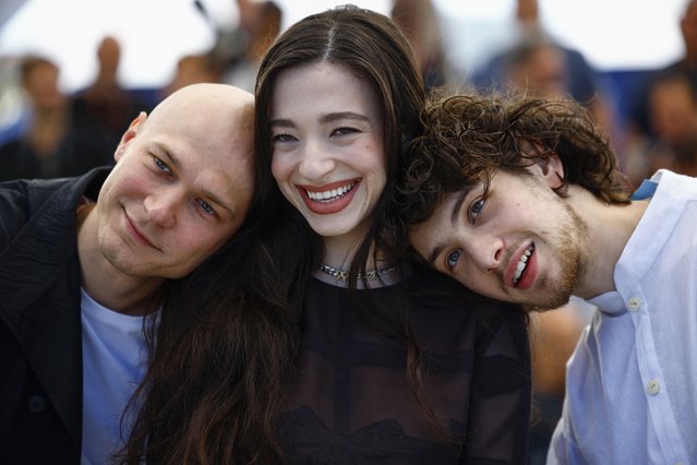 Cast members Mikey Madison, Yuriy Borisov and Mark Eydelshteyn pose during a photocall for the film “Anora” in competition at the 77th Cannes Film Festival in Cannes, France, on May 22, 2024. (Photo by Sarah Meyssonnier/Reuters)