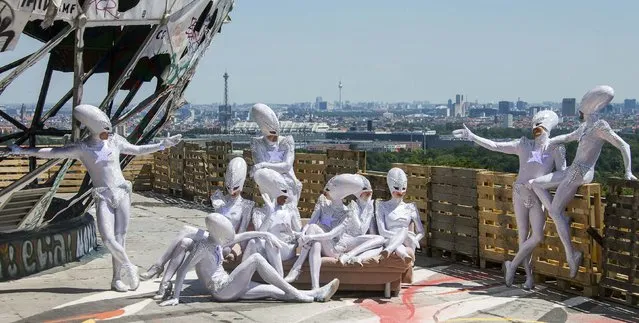 Dancers of the Friedrichstadt-Palast from the show “THE WYLD” pose during a promotional photocall at a former National Security Agency (NSA) listening station at the Teufelsberg (Devil's Mountain) in Berlin, Germany, July 2, 2015. (Photo by Hannibal Hanschke/Reuters)