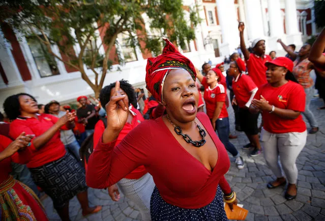 Members of Julius Malema's Economic Freedom Fighters (EFF) party sing after they were evicted from Parliament during President Jacob Zuma's question and answer session in Cape Town, South Africa, May 17, 2016. (Photo by Mike Hutchings/Reuters)