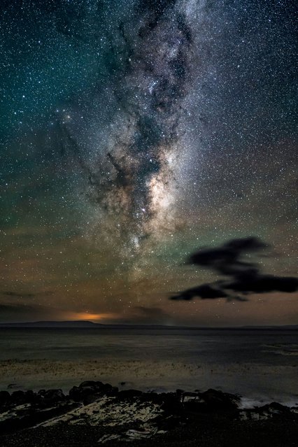 A view shows the Milky Way in a starry sky, in Punta del Arbol, Chile on May 12, 2024. (Photo by Joel Estay/Reuters)