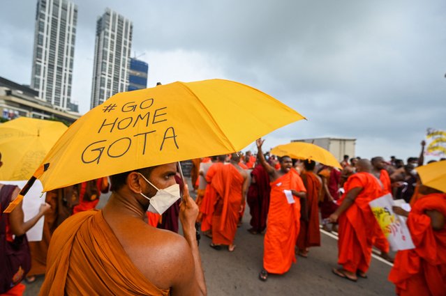 Buddhist monks participate in an anti-government demonstration outside the President's office in Colombo on May 3, 2022, demanding President Gotabaya Rajapaksas resignation over the country's crippling economic crisis. (Photo by Ishara S. Kodikara/AFP Photo)