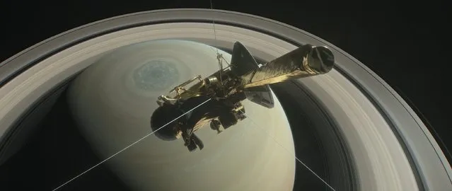An undated handout photo made available by NASA shows an illustration of NASA's Cassini spacecraft above Saturn's northern hemisphere prior to one of its 22 grand finale dives, in Space. On 26 April 2017, the spacecraft will make the first in a series of 22 dives through the 2,400km gap between Saturn and its rings as part of its mission's grand finale. The spacecraft will then end its expedition on 15 September 2017, with a final plunge into the gas giant. The operation aims at gaining insights into the planet's structure and atmosphere as well as at capturing views of its inner rings. NASA's Cassini spacecraft is in orbit around Saturn since 2004. (Photo by EPA/NASA/JPL-Caltech)