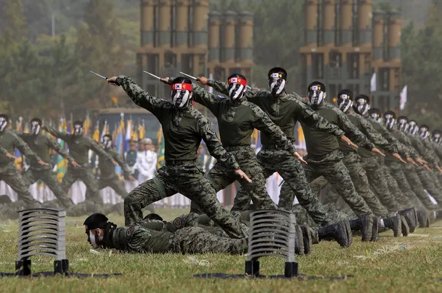 South Korean soldiers perform during the media day of the 65th South Korea Armed Forces Day ceremony on September 25, 2017 in Pyeongteak, South Korea. The anniversary ceremony is to mark that South Korean Army crossed the 38 parallel on October 1, 1950 during the Korean War. (Photo by Chung Sung-Jun/Getty Images)
