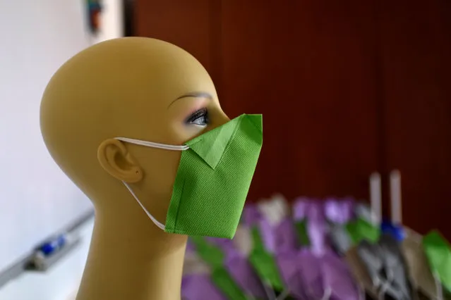 A mannequin shows a face mask produced by clothing designers Stalina Svieykowsky and Nelson Jimenez in response to the coronavirus disease (COVID-19), in San Antonio de los Altos, Venezuela on March 18, 2020. (Photo by Carolina Cabral/Reuters)